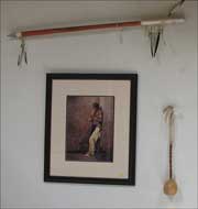 Picture, spear and rattle collected by Laura's family