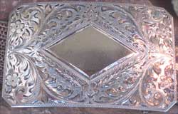 Joe Whitecloud's silver belt buckle