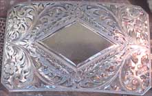 Silver belt buckle