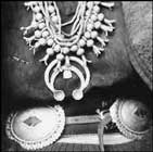 Old photo of a concha belt and silver jewellery worn by a Navajo woman