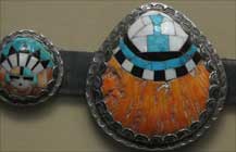 A silver concha belt with turquoise and amber 