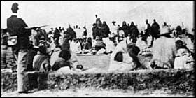 Old photo of Navajo people being kept by force at Bosque Redondo near Fort Sumner